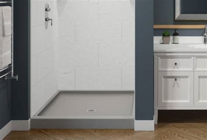 How do you clean a Swanstone shower base?